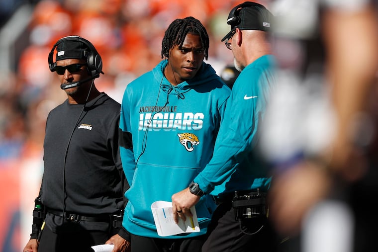 Jacksonville Jaguars cornerback Jalen Ramsey talks with defensive coordinator Todd Wash on the sideline during a game against the Denver Broncos.