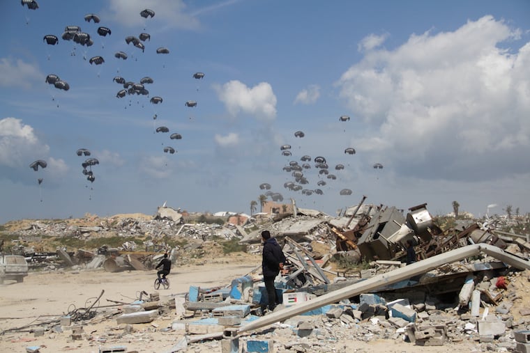 Humanitarian aid is airdropped to Palestinians over Gaza City, Gaza Strip, on Monday, March 25, 2024.