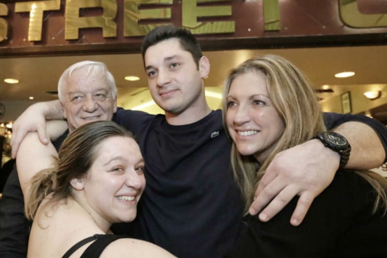 The Plessas family (from left: Kaycie, Jimmy, Johnny and Joanne Plessas) held a farewell event Sunday at the family's 2 Street Café as they prepare to close it after 25 years in the Gallery mall.