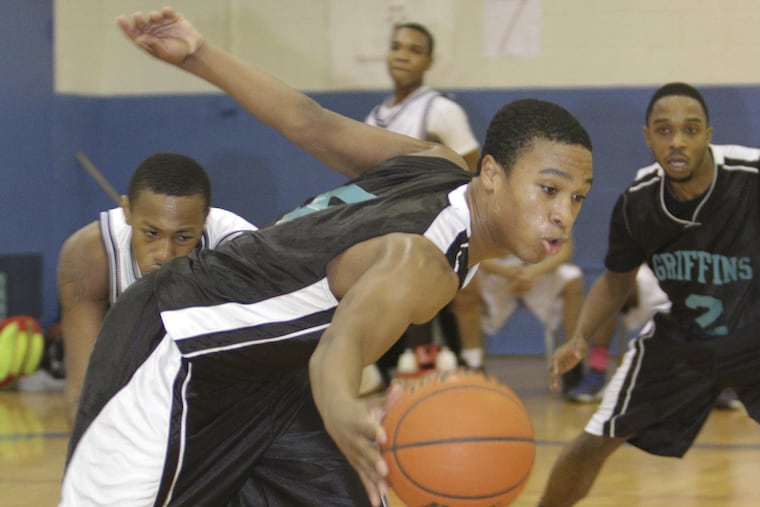 Palumbo's Anwar Epps drives against Roxborough during the fourth quarter.