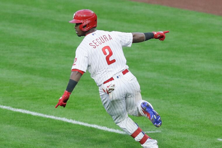 Phillies second baseman Jean Segura celebrates Thursday after delivering a game-winning single in his team's 3-2 opening-day win over the Atlanta Braves at Citizens Bank Park.