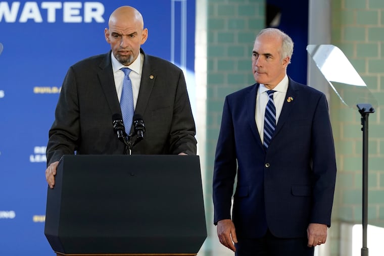Sen. John Fetterman (D, Pa.) speaks as Sen. Bob Casey (D., Pa.) listens at this 2023 event. Fetterman said he would support Adeel Mangi's nomination to serve on the U.S. Court of Appeals for the Third Circuit. Casey was noncommittal.