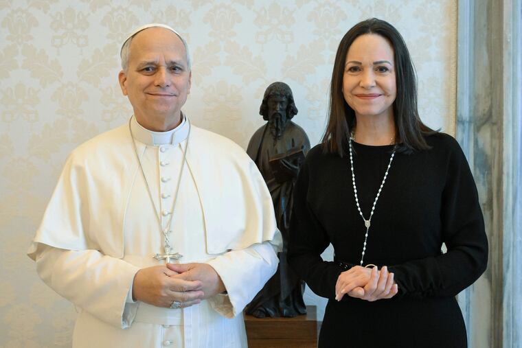 This image released by Vatican Media shows Pope Leo XIV meeting with Nobel Peace Prize laureate María Corina Machado of Venezuela, right, inside his private library at the Vatican, Monday, Jan. 12, 2026.