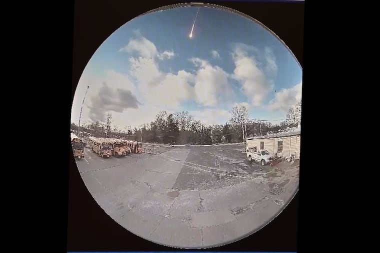 This image made from video shows video taken from a surveillance camera showing a suspected meteor falling through the sky in Olmsted Falls, Ohio, on Tuesday, March, 17, 2026. (Olmsted Falls City Schools via AP)