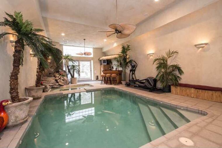Between 1998 and 2000, the current owners transformed that property into a 4,880-square-foot, four-bedroom home, with features including an indoor pool and spa and an elevator to traverse all four stories.