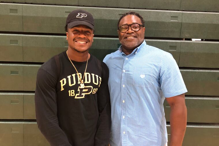 Cedar Creek’s Malachi Melton (left) and his father, Gary Melton.