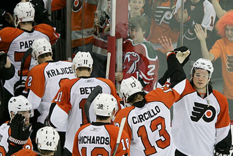 The Flyers leave the ice after beating the New Jersey Devils. They last played on April 22. (Yong Kim / Staff Photographer)