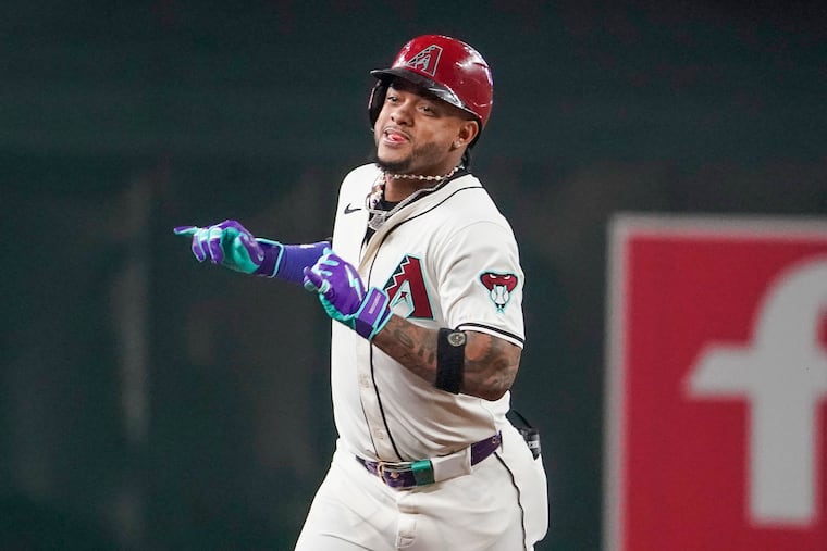 Arizona Diamondbacks' Ketel Marte celebrates after his solo-home run against the Phillies during the first inning of their game on Saturday.