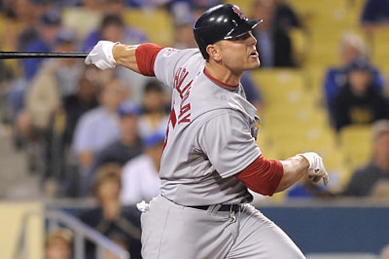 The Cardinals are 25-9 since July 24, the day they acquired slugger Matt Holliday from Oakland. (Mark J. Terrill / AP file photo)