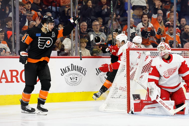 The Flyers' Scott Laughton celebrates after scoring on Detroit's Cam Talbot during his four-goal performance on Dec. 12.