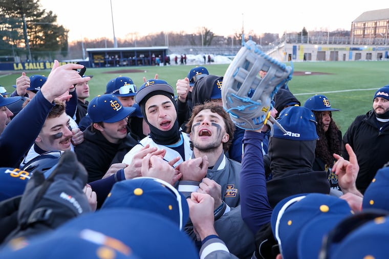 The La Salle Explorers huddle after their 27-10 win against the Maryland Eastern Shore Hawks at Hank DeVincent Field.