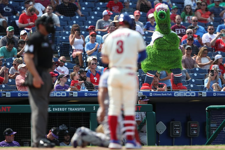 The Phanatic watches Bryce Harper step into the batter's box Sunday at Citizens Bank Park.