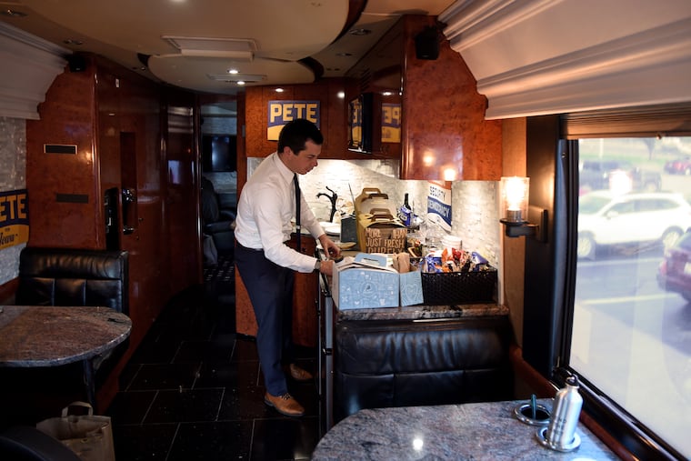 Democratic presidential candidate Mayor Pete Buttigieg prepares breakfast on the bus in the early morning of Sept. 24, 2019, before leaving his motel in Dubuque, Iowa, on the final leg of his four-day bus tour with reporters.