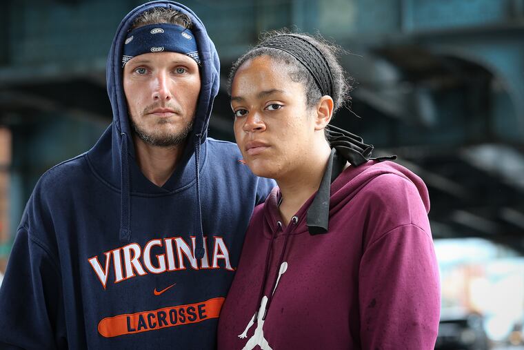 Daniel Schroeder (left) and Ariana Kemecak, a homeless couple who have been living on the streets of Kensington since January, at Kensington Avenue and Tioga Street in Philadelphia. “It’s hard even without the virus to find a couple’s shelter,” Schroeder said.