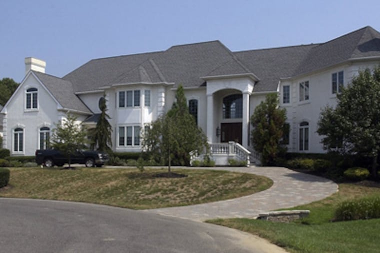 Terrell Owens' Moorestown house has been for sale for several years. The latest asking price is $2.65 million, down from the original $4.4 million. (Akira Suwa / Staff Photographer)