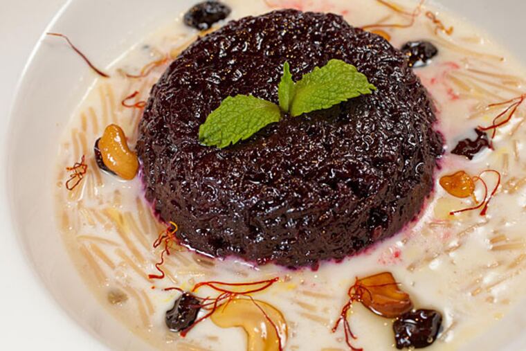 Rava masala, crispy semolina wheat dosa with spiced creamy potatoes and cashews as served at Bangles, Downingtown. (David M Warren/Staff Photographer)