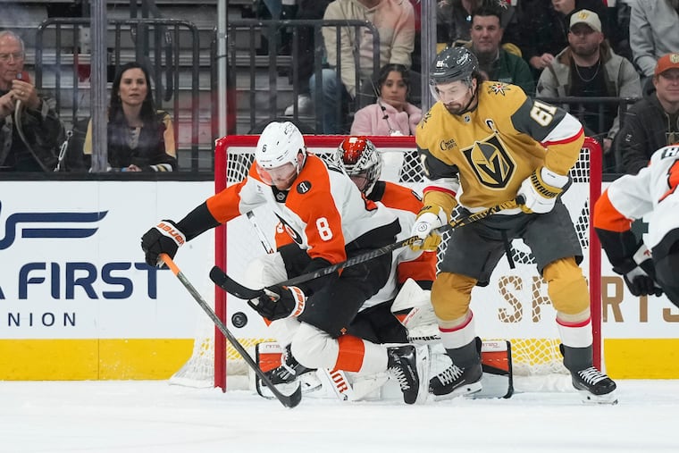Flyers defenseman Cam York blocks a shot in front of Golden Knights right wing Mark Stone (61) during the first period Monday.