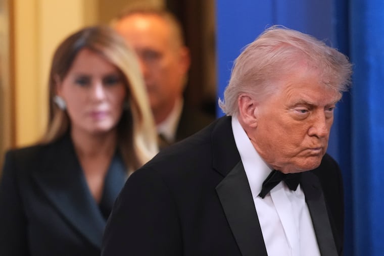 President Donald Trump with first lady Melania Trump, walks in to speak in the James Brady Press Briefing Room at the White House after an unspecified threat at the annual White House Correspondents' Association Dinner in Washington, Saturday, April 25, 2026.