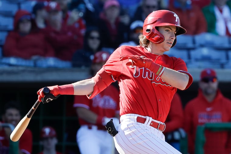 Bryson Stott hitting during a February Grapefruit League game in Clearwater, Fla.