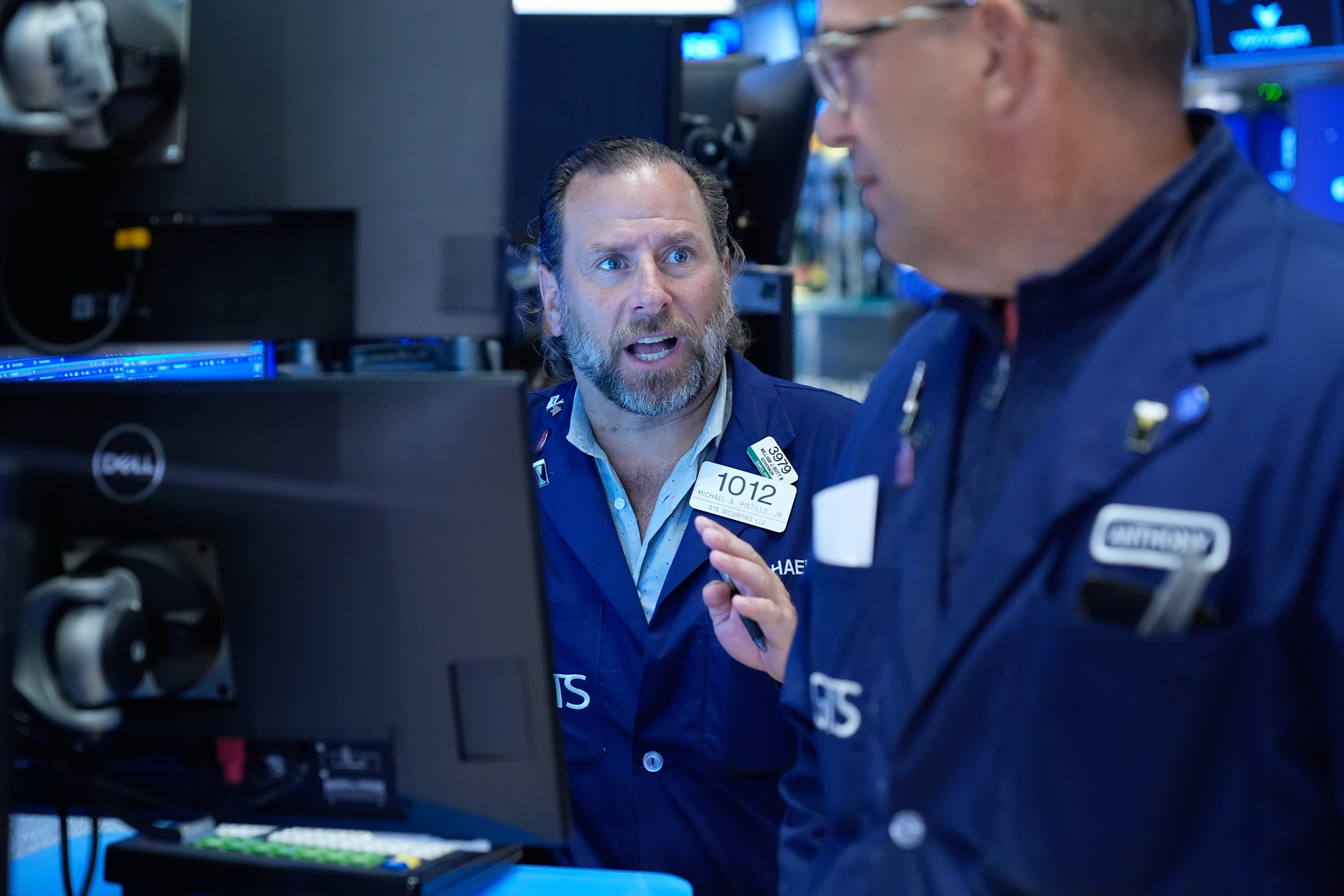 US stocks hold near their record as the price of Brent crude falls back below $100 a barrel