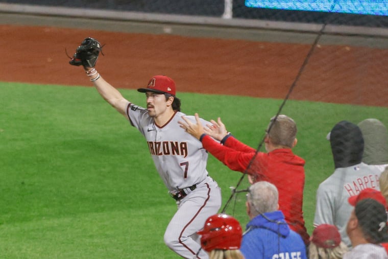 Diamondbacks outfielder Corbin Carroll catches the final out to win Game 7 of the National League Championship Series over the Phillies on Oct. 24, 2023 at Citizens Bank Park.