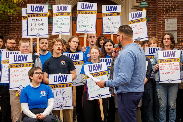 Wence Valentin III, a political director for UAW Region 9, turns toward graduate students calling for strike vote against University of Pennsylvania.