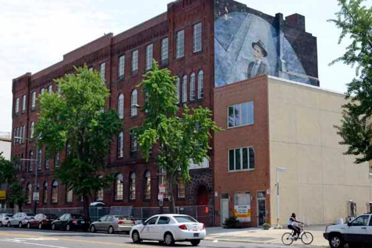 The old National Guard Third Regiment Armory on South Broad Street just north of Wharton June 26, 2013. Built in 1886, it is being demolished early due to roof problems and community concern following the Salvation Army Thrift Store collapse. ( TOM GRALISH / Staff Photographer )