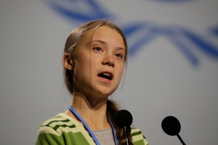 Swedish climate activist Greta Thunberg addresses plenary of U.N. climate conference during with a meeting with leading climate scientists at the COP25 summit in Madrid, Spain, Wednesday, Dec. 11, 2019.