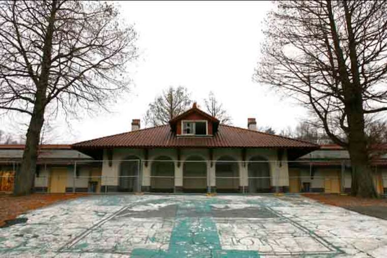 The East Park Canoe House near Strawberry Mansion Bridge is shuttered and fenced. (Charles Fox / Staff Photographer)
