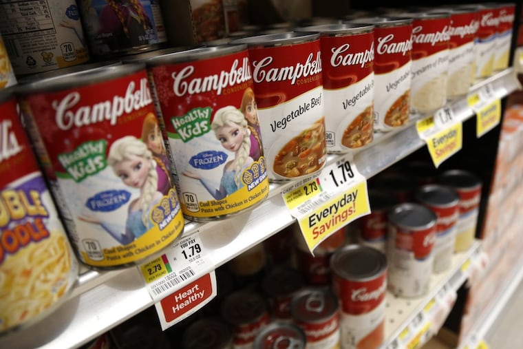 Campbell Soup Co.’s proposed $4.9 billion acquisition of snack manufacturer Snyder’s–Lance will shift the Camden company’s center of gravity away from its namesake canned soups, shown here in an Englewood, N.J., supermarket in May.