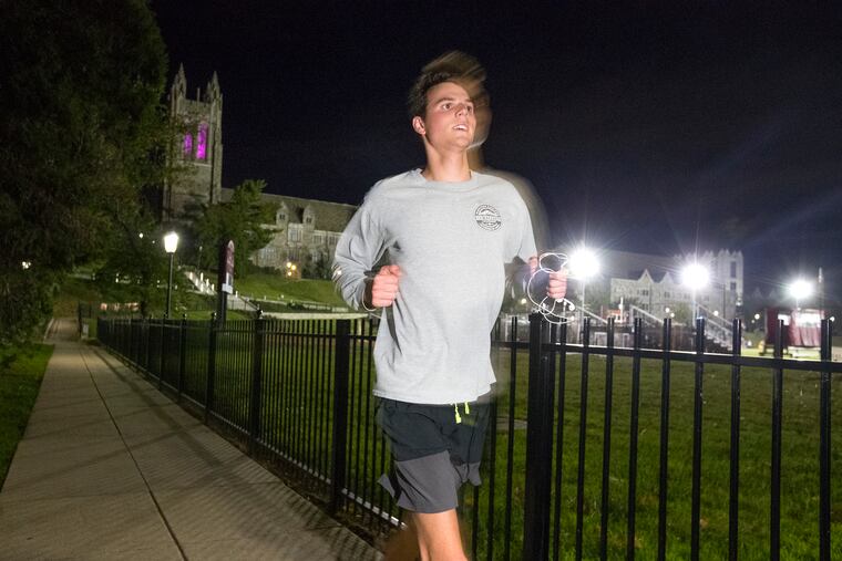 Ethan Widrig, a St. Joseph’s student is running a 5K every single day for 100 days to raise money for Alzheimer's awareness and research. He usually runs at night. He is shown on Oct. 11, 2019.