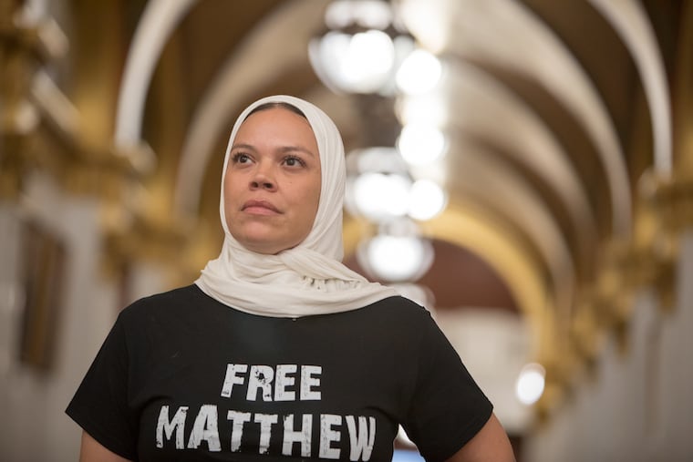 Carisia Magobet participates in a rally at the state Capitol in Harrisburg.