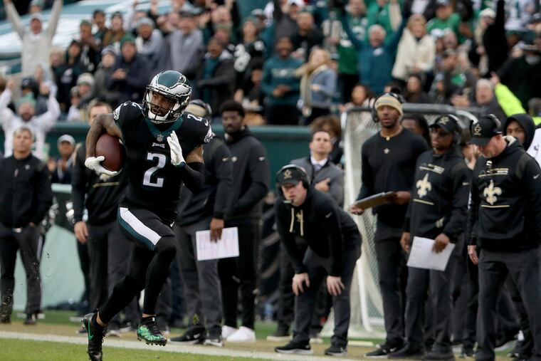Eagles cornerback Darius Slay returns an interception for a touchdown in the second quarter against the Saints.