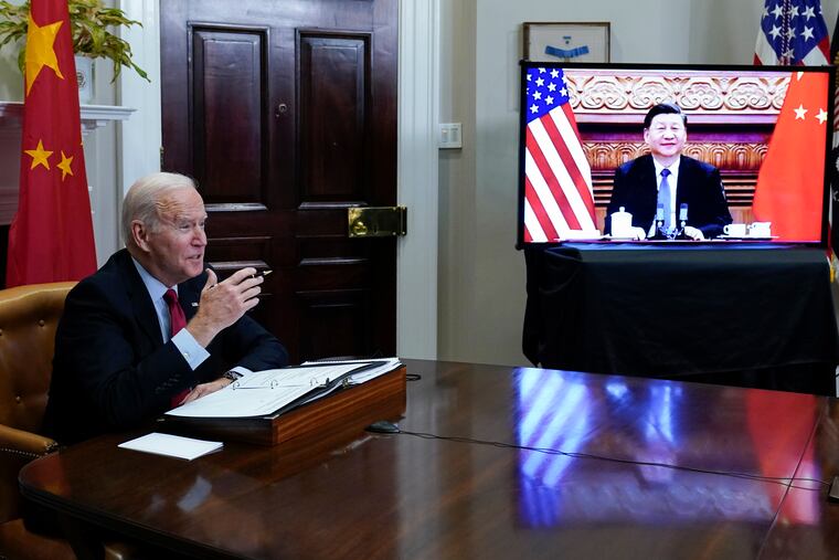 President Joe Biden meets virtually with Chinese President Xi Jinping from the Roosevelt Room of the White House in Washington, on Nov. 15, 2021.