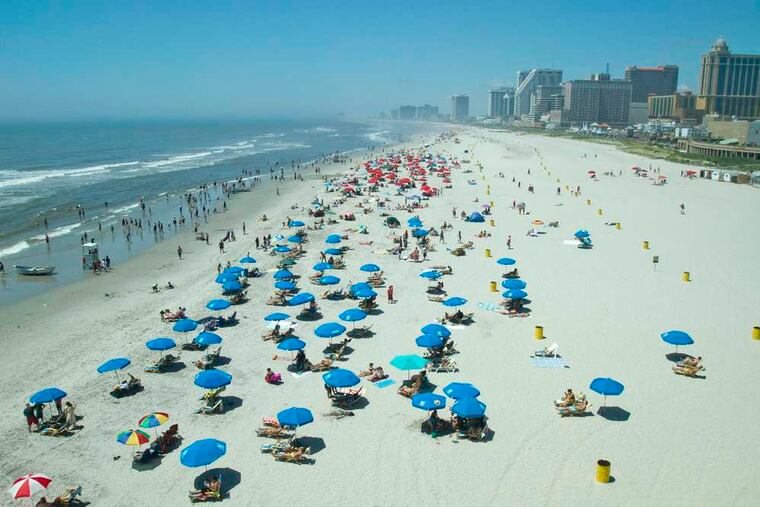 While temperatures in Philadelphia were uncomfortably high, swimmers and sunbathers in Atlantic City enjoyed the ocean's cooling effects.