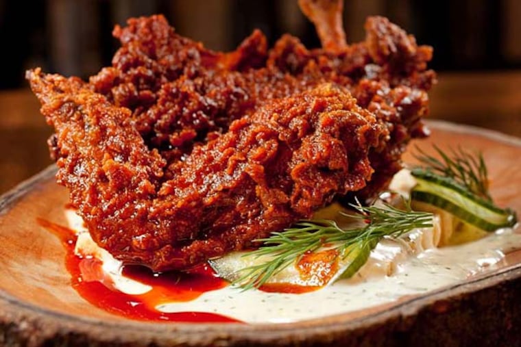 Stings so good: The Fat Ham's "Nashville Hot Chicken" with white bread, ranch dressing, and dill pickles. And no, you can't get the hot sauce on the side.