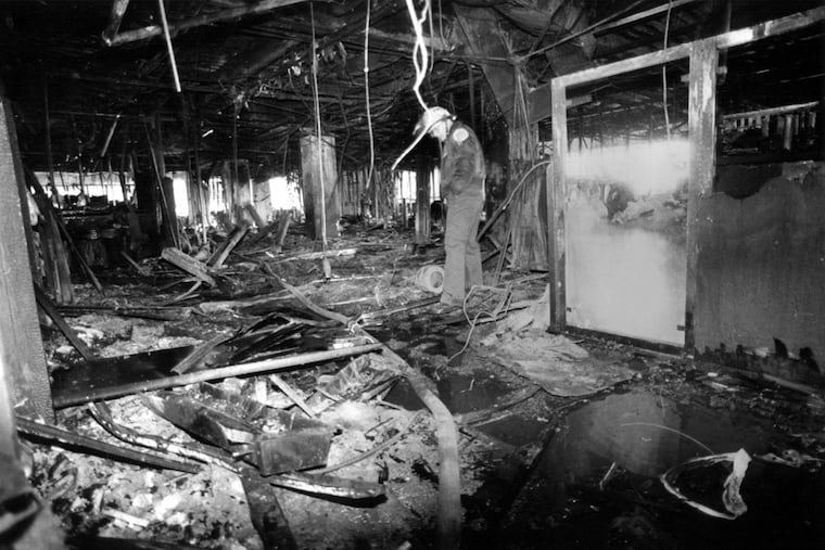 Philadelphia Fire Department Lt. Robert Buckley during an aftermath inspection on Feb. 24, 1991.
