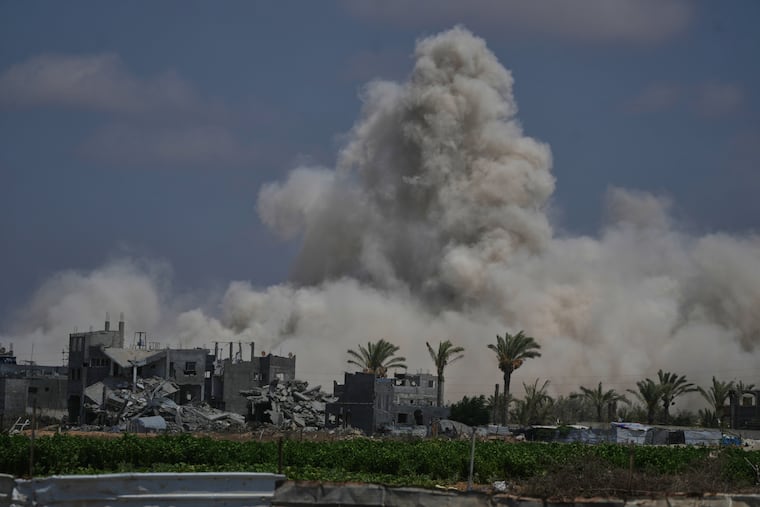 The Israeli army demolishes buildings east of Deir al-Balah, central Gaza Strip, Saturday Aug. 22, 2026.