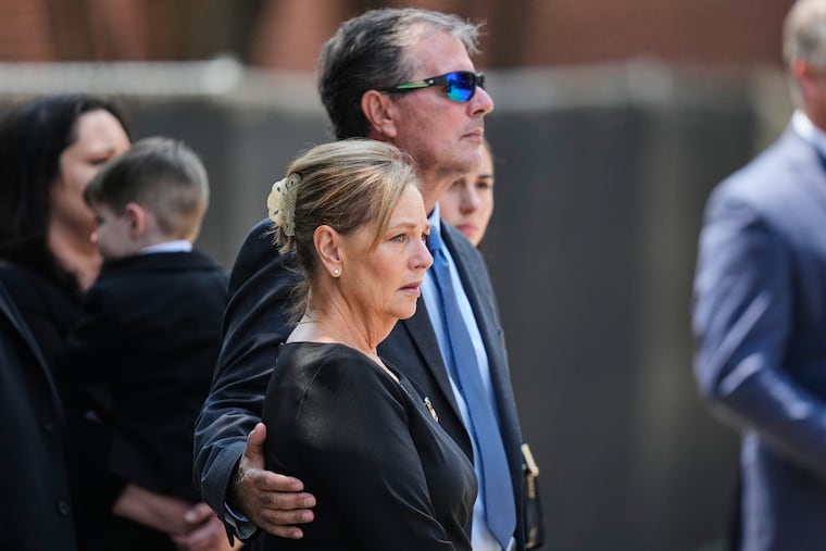 Sen. Darline Graham (R., S.C.), the sister of the late Sen. Lindsey Graham, R-S.C., looks on as her brother's casket is carried out of First Baptist Church in Columbia, S.C., following a funeral service, Wednesday, July 29, 2026.