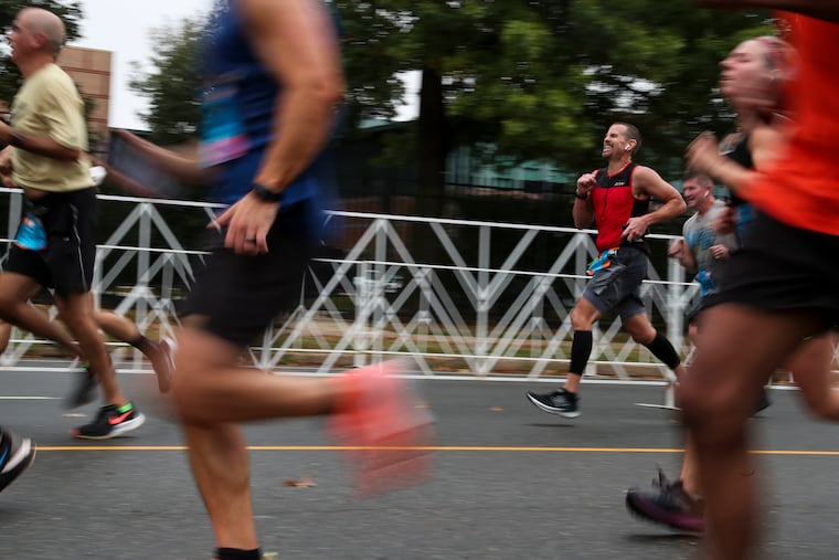 Runners approach the finish line during the Broad Street Run in Philadelphia in October 2021. About 17,000 racers who participated were required to provide proof of vaccination.
