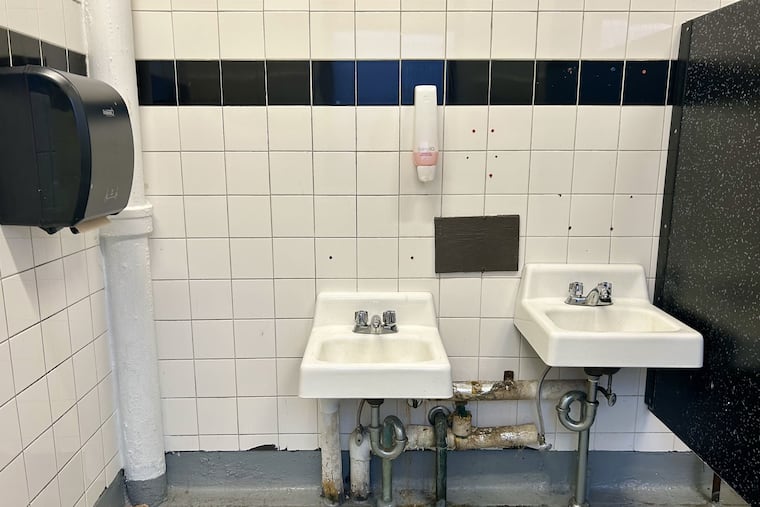 A student bathroom at a school in the Philadelphia School District. District records show that it takes 50 days to fix the average broken bathroom.
