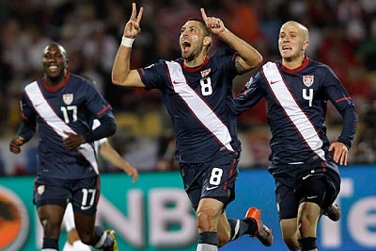 Clint Dempsey celebrates after tying the score in the United States' game against England. (AP Photo/Elise Amendola)
