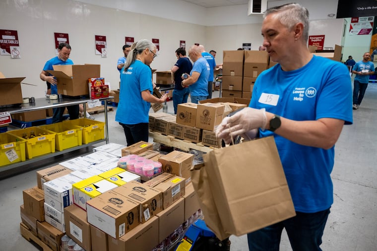 Volunteers from Subaru prep deliveries at the Food Bank of South Jersey last week. Trump administration cuts have increased hunger to the highest levels in six years, according to a study released in late May by the New York Federal Reserve.