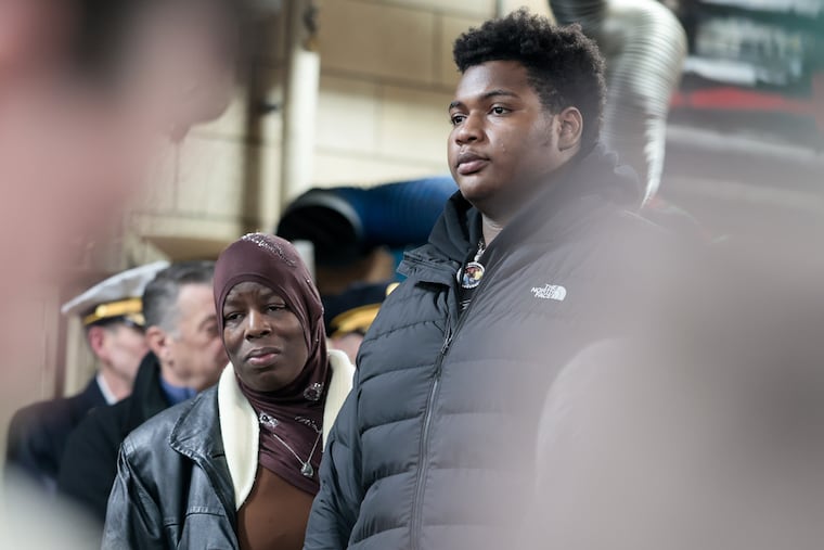Alberta “Amira” Brown (center), the grandmother of 10-year-old Ramesses Dreuitt Vazquez, who was severely burned after a plane crashed into his North Philadelphia neighborhood last year, Dominick Goods, 16 (right), lost both parents. The community is gathering for the one year anniversary memorial observance of the Northeast Philly plane crash Saturday, Jan. 31, 2026, at Engine 71 Fire Station on Cottman Ave., in Philadelphia
