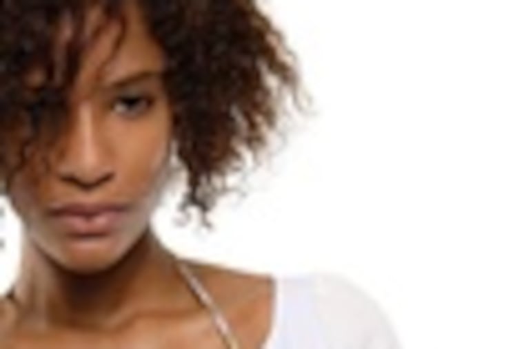 Target hits the bull's-eye with affordable designer duds, including this "poet blouse," swimsuit top, and linen shorts with tie - each piece under $30.