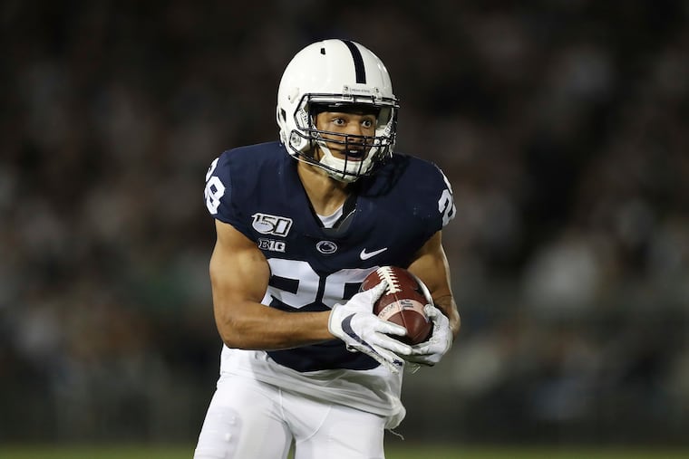Penn State cornerback John Reid returns an interception for a touchdown against Buffalo on Sept. 7, 2019. Reid became a fourth-round pick of the Houston Texans in the NFL draft on Saturday.