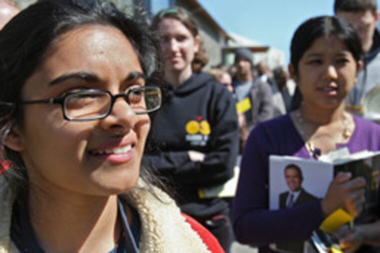 Hillary Rodham Clinton got the absentee vote of Monica Rao (left) of Doylestown,a Haverfordstudent who heard Michelle Obama. SaidPennsylvania College Democrats head Rachel Moore: "We feel so electrified by this campaign."