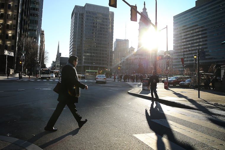 Michael DiBerardinis (left), the city's managing director is retiring after five decades on the front lines in Philadelphia. He heads into one of his last days at the office.