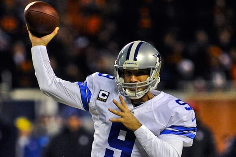 Dallas Cowboys quarterback Tony Romo (9) throws in the first half of their game against the Chicago Bears at Soldier Field. (Matt Marton/USA Today)