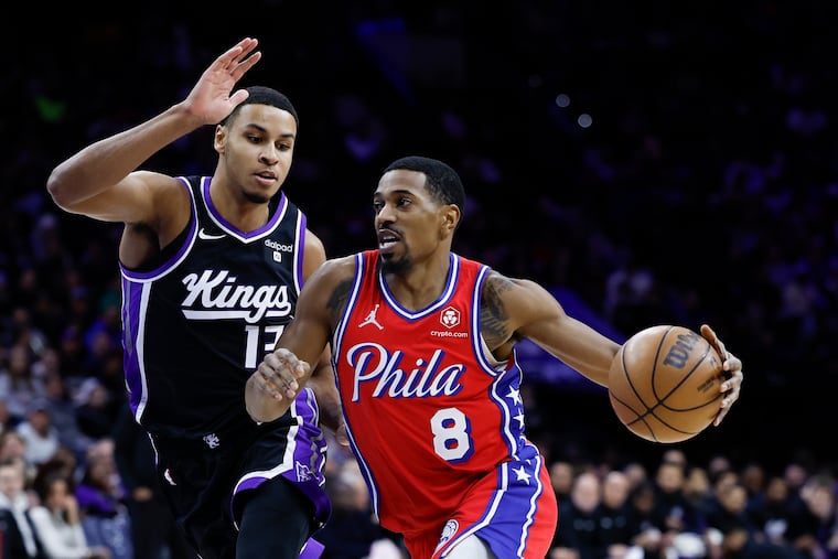Sixers guard De'Anthony Melton dribbles the ball against Sacramento Kings forward Keegan Murray earlier this month.